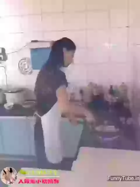 Cooking by a funny girl