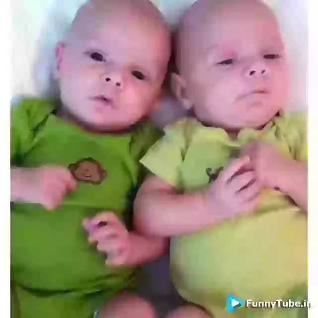 Funny baby sneezing together