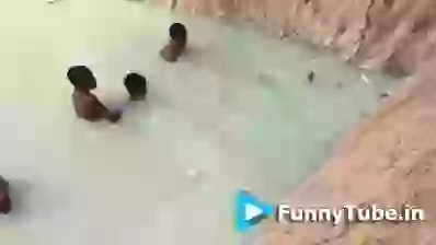 Kids playing with anaconda